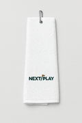 NEXT PLAY Tour Towel — tri-fold cotton golf towel with carabiner clip and tonal embroidery